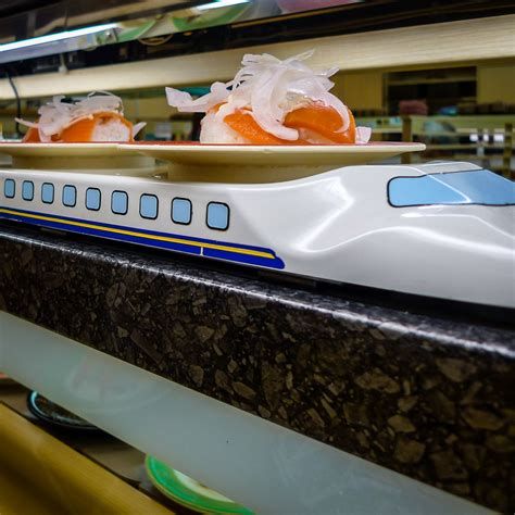 Spellbound Dining: The Phenomenon of Swift Sushi on a Train
